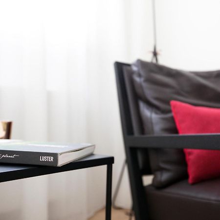Maison Nationale City Flats & Suites Αμβέρσα Δωμάτιο φωτογραφία The interior of the hotel